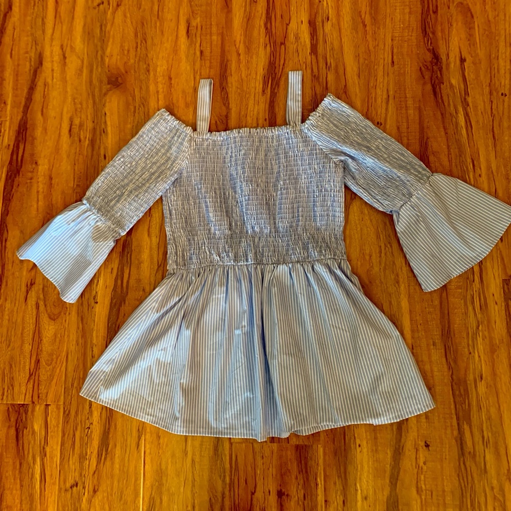Blue/white open shoulder medium sized top.